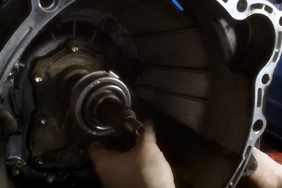 The picture shows workers maintaining the clutch release bearing