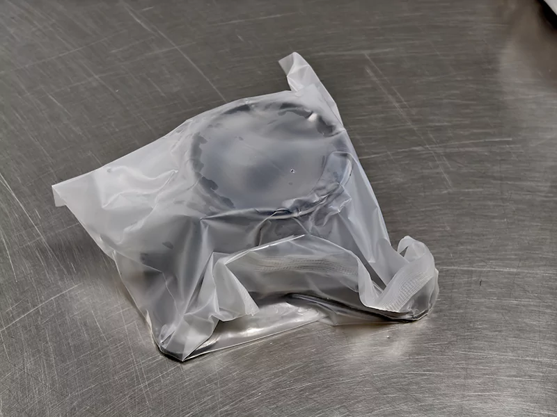 The picture shows a bearing packaged in a PE bag