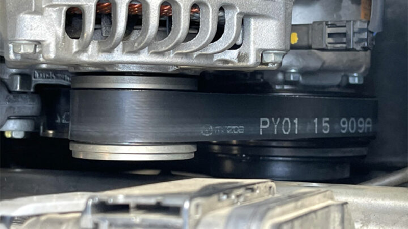A worn serpentine belt can be a sign of improper belt tension caused by a failing tensioner pulley