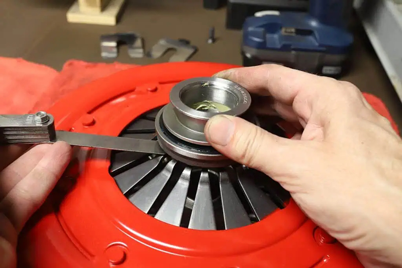 Clutch release bearing installed with clutch pressure plate for vehicle clutch system